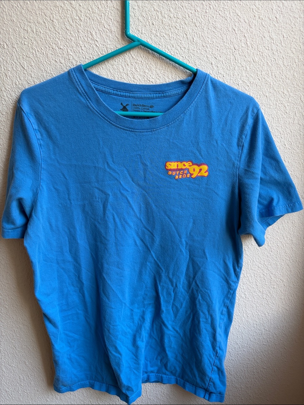 Dutch Bros Blue Short Sleeve Tee with Yellow-Orange Logo